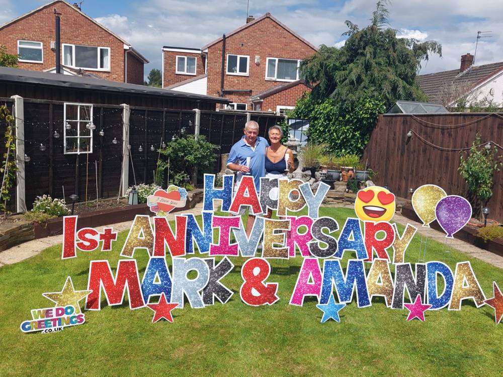 Happy 1st Anniversary Mark & Amanda in a back garden