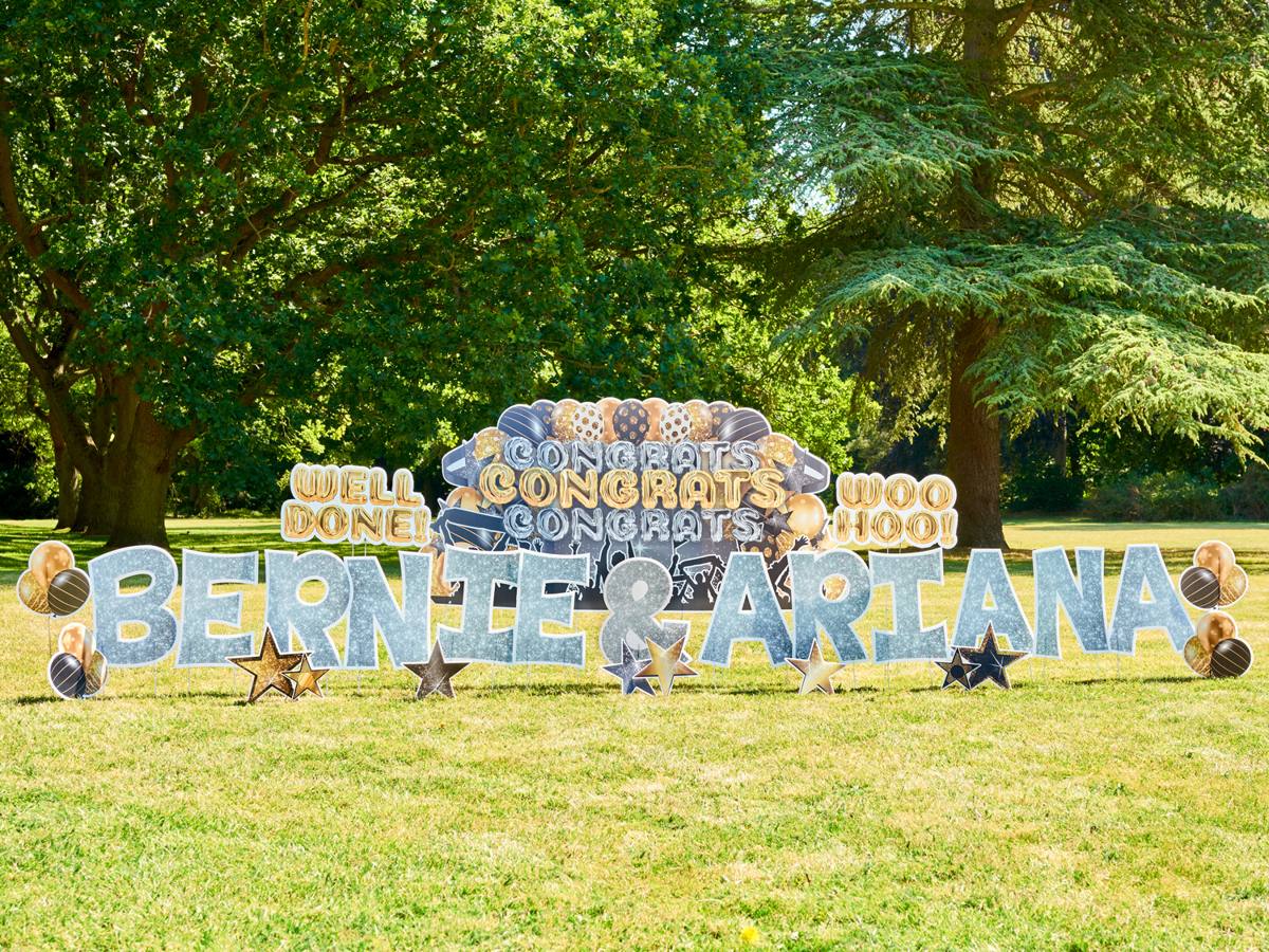 Congratulations Bernie & Ariana display on a country house lawn