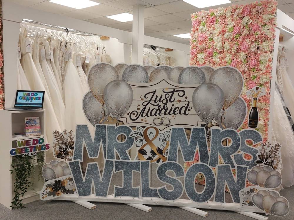 Just Married Mr & Mrs Wilson display in a bridal boutique