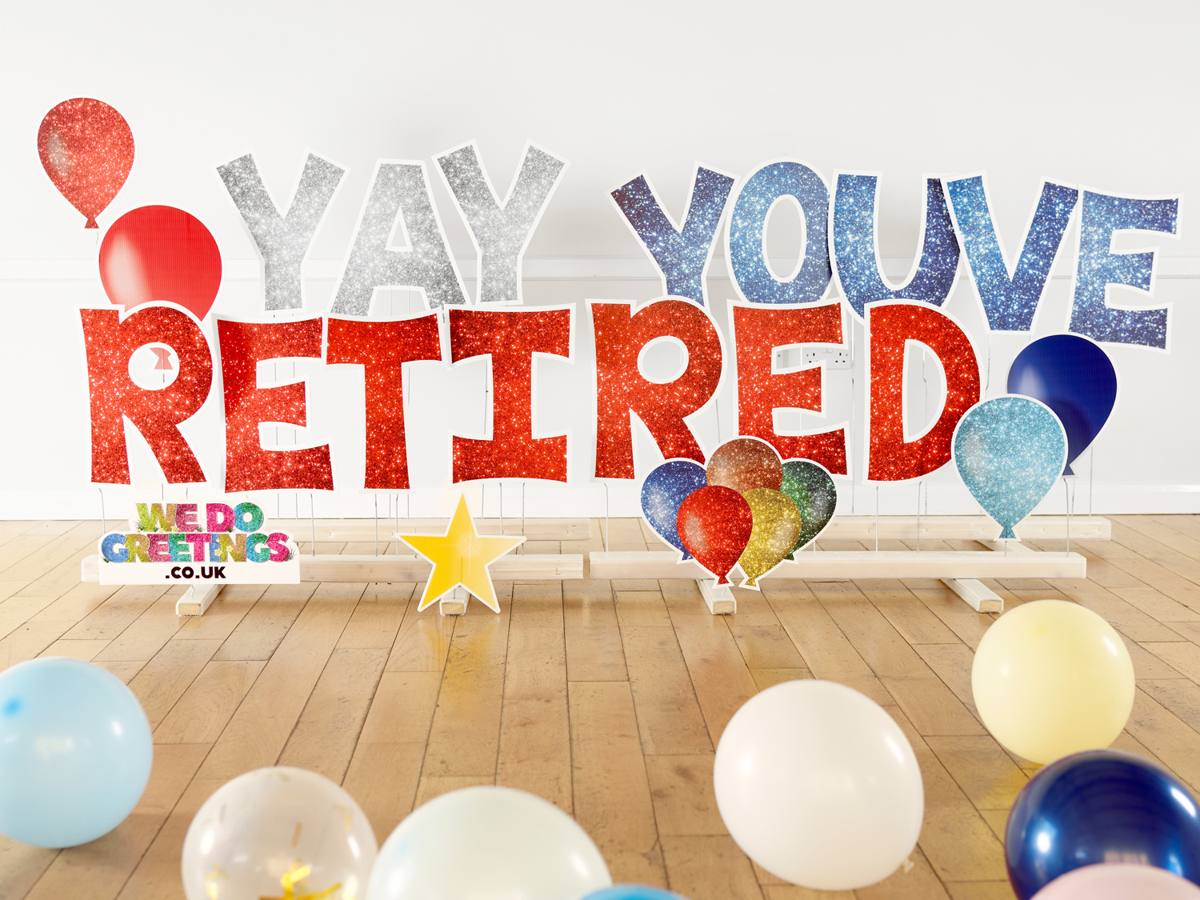Yay You've Retired in glitter letters with balloons